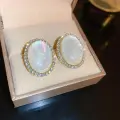 Oval Pearl Glow Studs Thumbnail Image 1