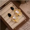 Sculpted Shine Earrings Thumbnail Image 2