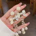 Pearl Whimsy Bow Drop Earrings Thumbnail Image 2